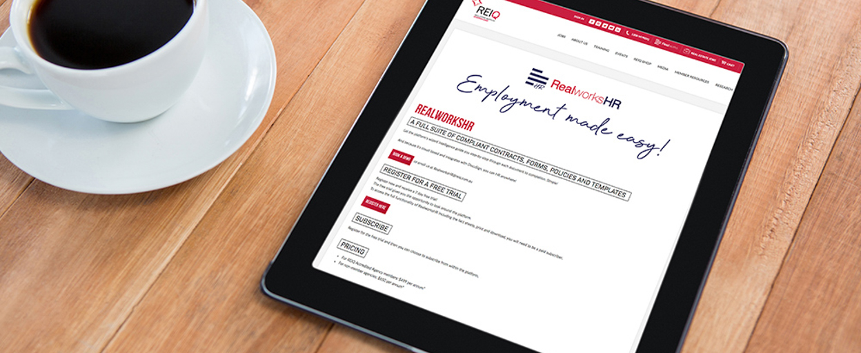 Ipad with text and coffee on desk