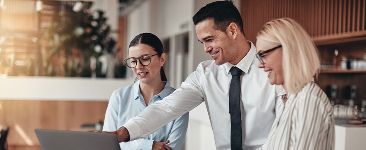 Casual staff at laptop