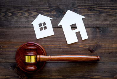 Judge's gavel and house|