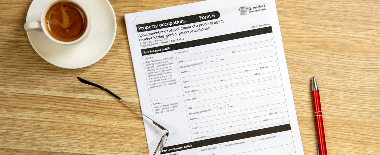 Form 6 on table with coffee and glasses