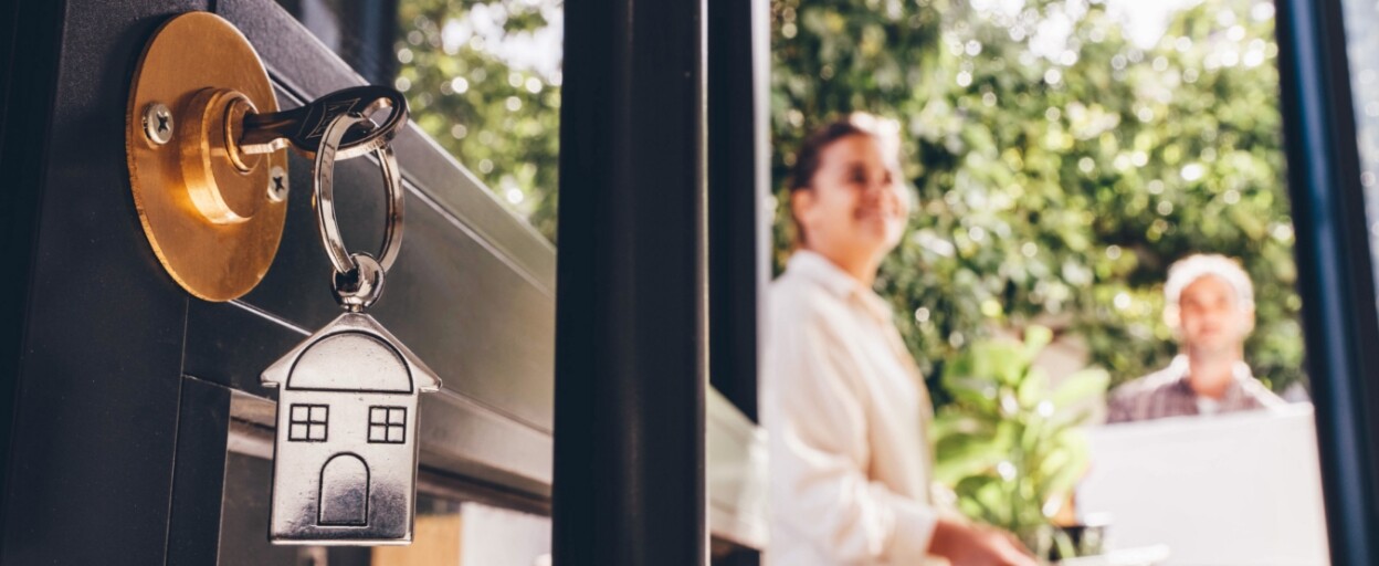 Key in the door of a home